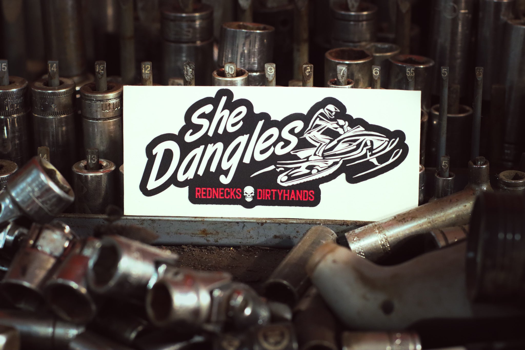 She Dangles Sticker
